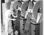 Film drying at photo lab of the 24th Mapping Squadron. June 10, 1944.