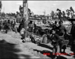A roadside produce market in China during WWII.