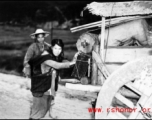 Chinese refugees push a cart of possession in Guangxi province, China, during WWII, in the fall of 1944, as the Japanese advanced during the Ichigo campaign.