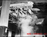 Bomb damage to a building at an American base in China during WWII.