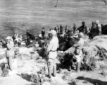 Chinese troops are river crossing in Yunnan province during WWII.