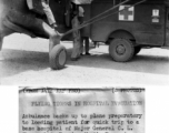 Ambulance backs up to plane preparatory to loading patient for quick trip to a base hospital of Major General C. L. Chennault’s Fourteenth Air Force in China. 