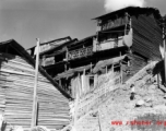 Wooden houses on hillside, either near Kunming in Yunnan province, or in Guilin or Liuzhou in Guangxi province, during WWII.