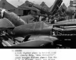 May 24, 1944  A P-40 fighter plane is hoisted from the Liberty Ship, "John Dockweiler", which brought fifteen planes from the U. S. to Karachi, India.  All of the planes were hoisted from the ship in slightly over an hour, during WWII.  Photo by Tec Sgt Roy J. Yarnell.