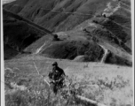 Fuel pipeline from India snakes over hills in SW China during WWII.   George E. Pollock.
