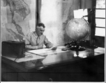 General Joe Stilwell pictured as he filmed the introduction to the film "Why We Are Here." Note boom microphone overhead.