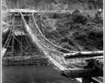 Pedestrian foot-bridge over water in the CBI during WWII.