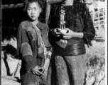 Two local ladies in Burma or SW China during WWII.
