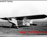 A tidy looking L-5 airplane parked in a field in the CBI during WWII.  Photo from Kenneth M. Sumney.