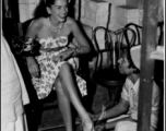 Jinx Falkenburg getting shoe fitted in Calcutta, India, in 1944 or 1945, USO troupe.