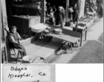 Shops in Kiunglai, China, during WWII.  Photo from James E. O'Brien.
