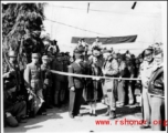 American and Chinese VIPs cut tape on the Burma Road during WWII.