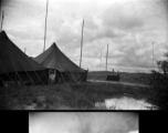 Radio station tents and towers, with antennas, at an American air base in WWII in Yunnan province, China.
